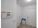 Laundry room with security system and exterior access at 2828 E Blackhawk Dr, Phoenix, AZ 85050