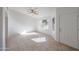 Living room with tile floors, large window, and neutral-colored walls at 2828 E Blackhawk Dr, Phoenix, AZ 85050