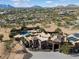 Aerial view showcasing the house and expansive desert lot at 30014 N Baker Ct, Scottsdale, AZ 85262