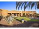 Landscaped backyard with putting green, gazebo, and desert plants at 30014 N Baker Ct, Scottsdale, AZ 85262