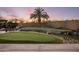 Landscaped backyard featuring a putting green at 30014 N Baker Ct, Scottsdale, AZ 85262