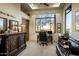 Spacious home office features built-in cabinetry and large window at 30014 N Baker Ct, Scottsdale, AZ 85262