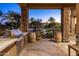 Outdoor kitchen area with grill and stone accents at 30014 N Baker Ct, Scottsdale, AZ 85262