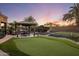 Private putting green in the backyard with gazebo at 30014 N Baker Ct, Scottsdale, AZ 85262