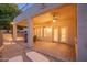 Relaxing backyard patio with seating area and brick flooring at 306 E Dennisport Ct, Gilbert, AZ 85295