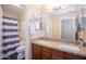 Bathroom with double vanity and shower/tub combo at 306 E Dennisport Ct, Gilbert, AZ 85295