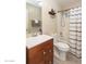 Clean bathroom with tub, shower, and updated vanity at 306 E Dennisport Ct, Gilbert, AZ 85295