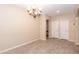 Breakfast nook featuring a chandelier and access to other rooms at 306 E Dennisport Ct, Gilbert, AZ 85295