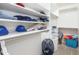 Large walk-in closet with ample shelving and hanging space at 306 E Dennisport Ct, Gilbert, AZ 85295