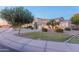 Two-story house with a landscaped yard and driveway at 306 E Dennisport Ct, Gilbert, AZ 85295