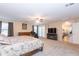 Main bedroom with ensuite bathroom and sitting area at 306 E Dennisport Ct, Gilbert, AZ 85295