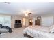 Main bedroom with ensuite bathroom and sitting area at 306 E Dennisport Ct, Gilbert, AZ 85295