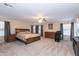 Spacious main bedroom with dresser and king bed at 306 E Dennisport Ct, Gilbert, AZ 85295