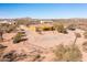 Aerial view of a desert home with a fenced yard at 31617 N 168Th St, Rio Verde, AZ 85263