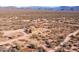 Aerial view of a house on a large desert lot with mountain views at 31617 N 168Th St, Rio Verde, AZ 85263