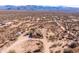 Aerial view of desert property featuring a large house and expansive land at 31617 N 168Th St, Rio Verde, AZ 85263