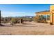 Backyard with desert landscape and partial house view at 31617 N 168Th St, Rio Verde, AZ 85263