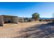 Metal barn with stalls and covered area for animals at 31617 N 168Th St, Rio Verde, AZ 85263