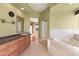 Main bathroom with large tub, double vanity and walk-in shower at 31617 N 168Th St, Rio Verde, AZ 85263