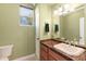 Well-lit bathroom with single sink vanity and tiled floor at 31617 N 168Th St, Rio Verde, AZ 85263