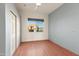 Simple bedroom with wood flooring and sliding door closet at 31617 N 168Th St, Rio Verde, AZ 85263