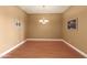 Bright dining room features hardwood floors and a chandelier at 31617 N 168Th St, Rio Verde, AZ 85263