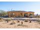 Desert landscape home with stucco exterior and tile roof at 31617 N 168Th St, Rio Verde, AZ 85263