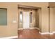 Bright foyer with hardwood floors and interior door at 31617 N 168Th St, Rio Verde, AZ 85263