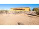 Backyard view of a tan ranch house with covered parking at 31617 N 168Th St, Rio Verde, AZ 85263