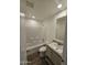 Clean bathroom, featuring a bathtub and modern vanity at 318 S Ellsworth Rd, Mesa, AZ 85208