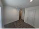 Bright bedroom with plush carpet and ample closet space at 318 S Ellsworth Rd, Mesa, AZ 85208