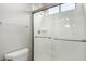 Clean bathroom with walk-in shower and glass enclosure at 3326 E Ivyglen Cir, Mesa, AZ 85213