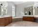 Primary bathroom with double vanity and large tub at 3326 E Ivyglen Cir, Mesa, AZ 85213