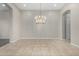 Formal dining room with tile floor and chandelier at 3326 E Ivyglen Cir, Mesa, AZ 85213