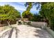 Outdoor kitchen with built-in grill and seating area at 3326 E Ivyglen Cir, Mesa, AZ 85213