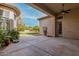 Covered patio with fountain and access to backyard at 3326 E Ivyglen Cir, Mesa, AZ 85213