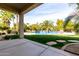 Inviting pool and patio area, perfect for relaxation and entertainment at 3326 E Ivyglen Cir, Mesa, AZ 85213