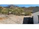 View of the landscape and neighboring homes from the backyard of the property at 3390 S Yaqui Ln, Gold Canyon, AZ 85118