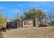 Stone monument sign for The Reserve at Tranquil Trail, with desert landscaping and clear blue sky at 37178 N Winding Wash Trl, Carefree, AZ 85377