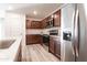 Stainless steel refrigerator in a modern kitchen setting at 3818 S 84Th Ln, Tolleson, AZ 85353