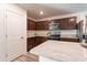 Kitchen with island, stainless steel appliances, and granite counters at 3818 S 84Th Ln, Tolleson, AZ 85353