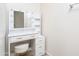 White vanity with lighted mirror and several drawers at 3818 S 84Th Ln, Tolleson, AZ 85353