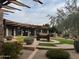 Landscaped courtyard with seating and fire pit feature at 3935 E Rough Rider Rd # 1270, Phoenix, AZ 85050