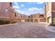 Community view with multiple buildings and a courtyard at 3935 E Rough Rider Rd # 1270, Phoenix, AZ 85050