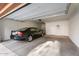 Attached garage with space for one car and extra storage at 3935 E Rough Rider Rd # 1270, Phoenix, AZ 85050