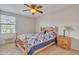 Charming bedroom with wooden bed frame at 4028 N Ranier --, Mesa, AZ 85215