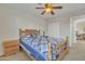 Charming bedroom with wooden bed frame at 4028 N Ranier --, Mesa, AZ 85215