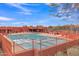 Community pool with lounge chairs and a large deck at 4028 N Ranier --, Mesa, AZ 85215