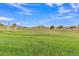 Expansive green golf course with distant mountains at 4028 N Ranier --, Mesa, AZ 85215