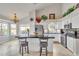 Bright kitchen with island, stainless steel appliances, and white cabinets at 4028 N Ranier --, Mesa, AZ 85215